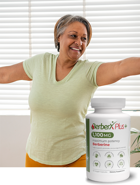 Young, slim man smiling beside a bottle of BerberX Plus.